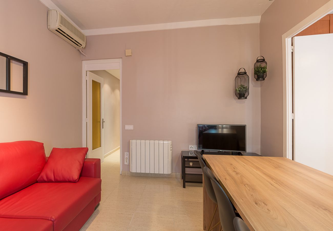modern living room of the apartment plaza españa in barcelona for holidays