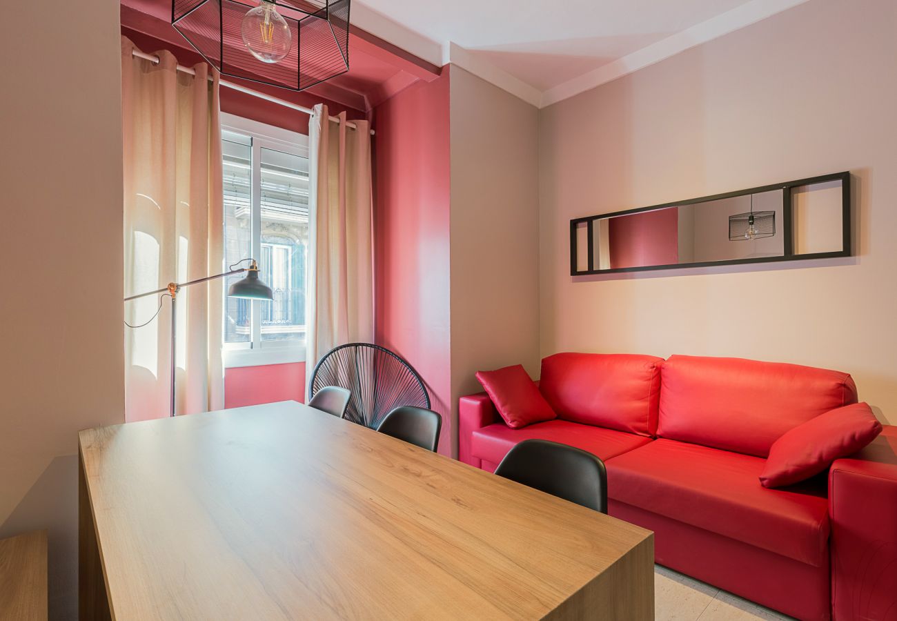 moderne woonkamer in het appartement Plaza España in het centrum van Barcelona