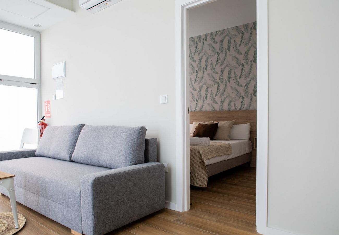 Appartement in Valencia - Port Suite IX | 4 Viajeros | AC & WiFi | 15 min Ciudad Artes