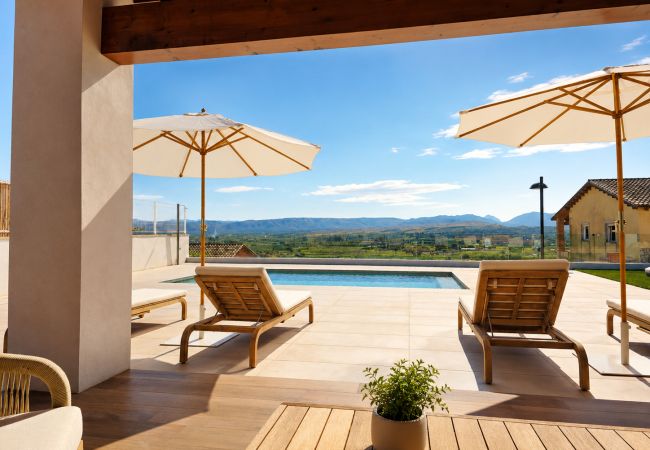 Chalet in L'Enova - Luxe Ecovilla | Zwembad en Barbecue | 8 Gasten